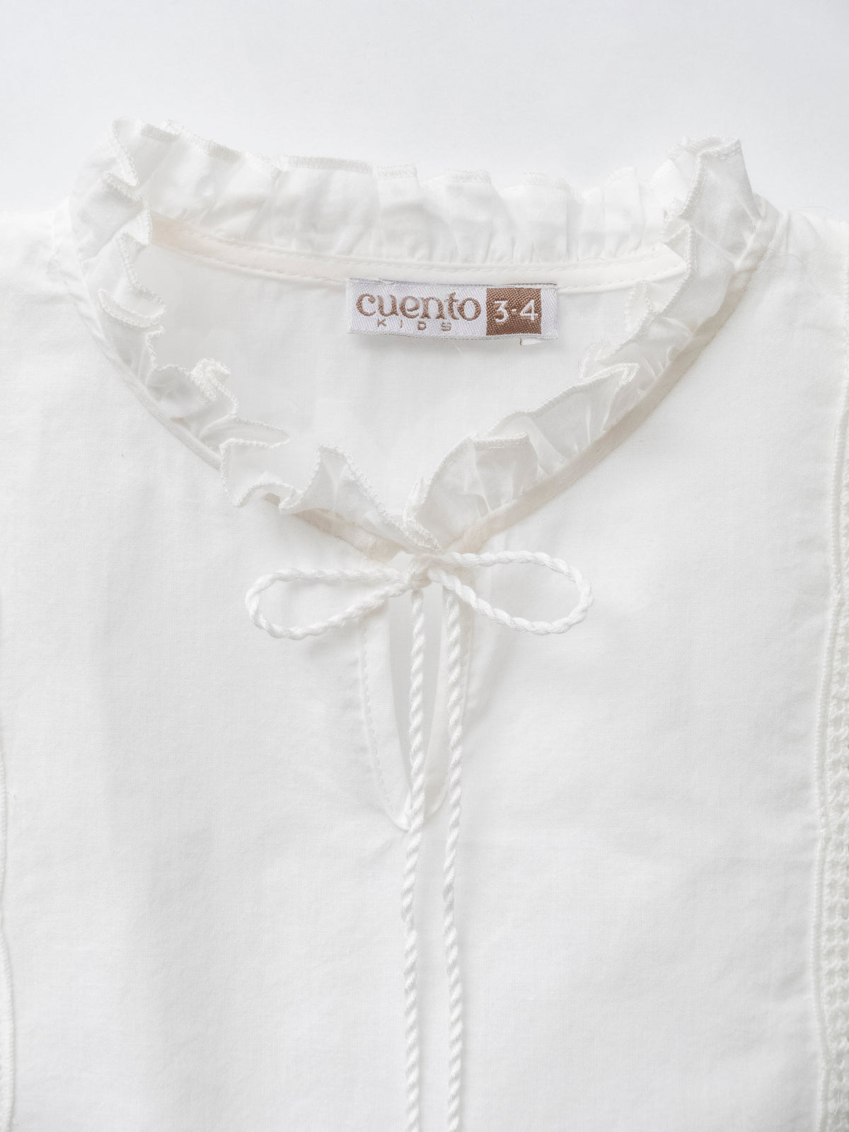 Eyelet Embroidered Blouse with Tassel Tie