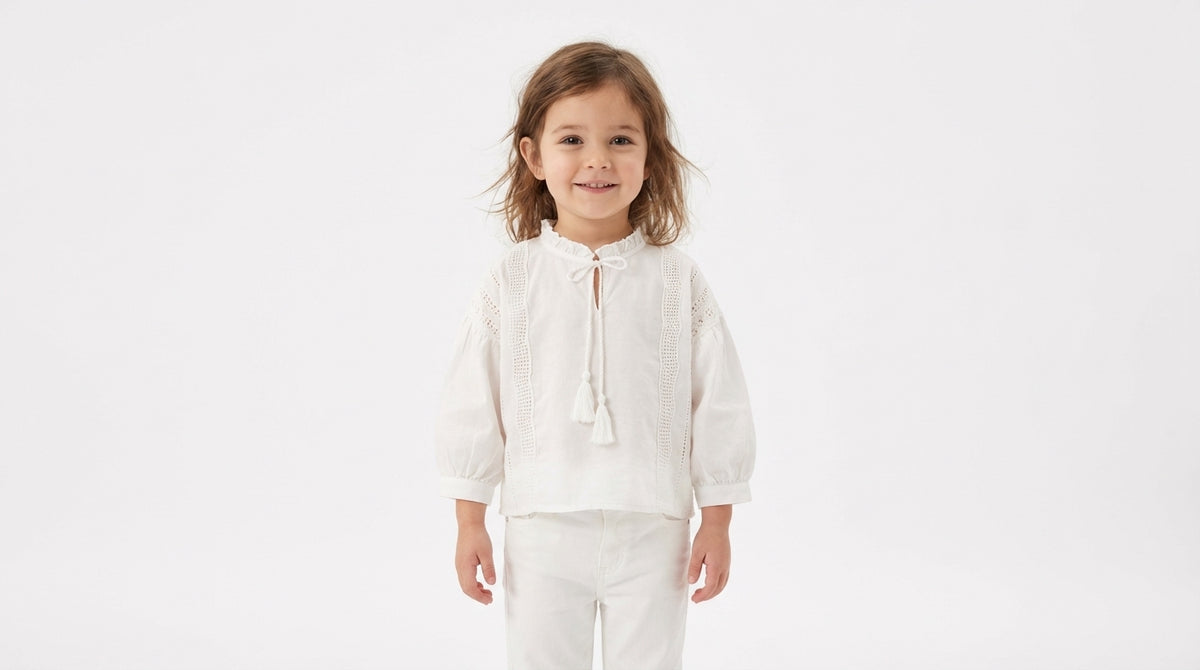 Eyelet Embroidered Blouse with Tassel Tie
